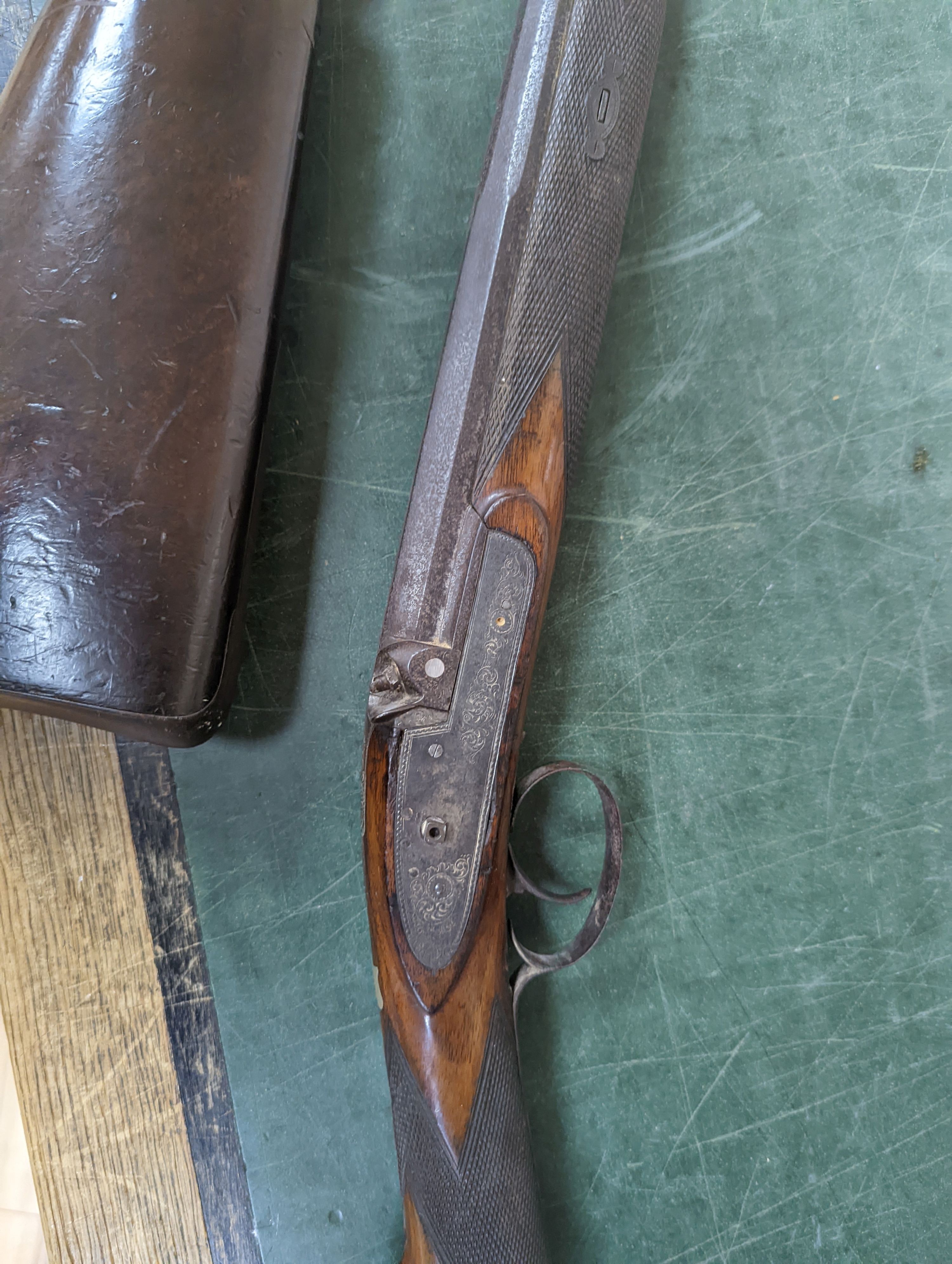 Two 19th century percussion muskets, 103cm. max., one double-barrelled